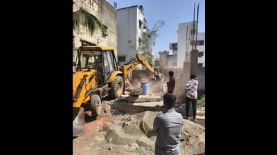Illegal tin sheds, RCC structures and encroachments on public land were unearthed during this action. (HT) Illegal tin sheds, RCC structures and encroachments on public land were unearthed during this action. (HT)