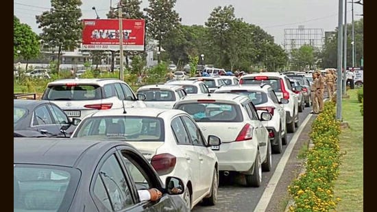 One side of the 200-ft-wide road was reserved for VIPs and the other side for spectators, leaving no space for daily commuters, complain residents. (HT Photo)
