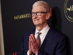 FILE PHOTO: Apple's CEO Tim Cook attends the American Film Institute (AFI) Awards Luncheon in Los Angeles, California, U.S., January 9, 2026. REUTERS/Mario Anzuoni/File Photo