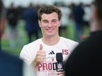 Indiana quarterback Fernando Mendoza gives a thumbs up after an interview with NFL Network(AP)