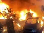 Officials said the fire damaged several vehicles, including five old ambulances parked inside a community health centre adjacent to the police station, one minibus, two mini trucks, two tractors, four autos, and 22 cars parked outside the police station. (Sakib Ali/HT Photo)