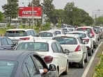 One side of the 200-ft-wide road was reserved for VIPs and the other side for spectators, leaving no space for daily commuters, complain residents. (HT Photo)