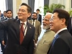 PM Modi poses for a selfie with the Korean President (extreme right).