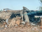 Rescue personnel at the site after a blast at a firecracker factory, where at least 16 people were allegedly killed and several injured, at Kattanarpatti, in Virudhunagar district in Tamil Nadu on Sunday. (PTI)