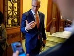 John Thune faces backlash from the MAGA movement for his reluctance to advance the SAVE America Act in the Senate as he said other matters take precedence (Photo by Andrew Harnik / GETTY IMAGES NORTH AMERICA / Getty Images via AFP)