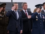 Defense Secretary Pete Hegseth and Army Secretary Dan Driscoll, with burgundy tie, visited Dover Air Force Base in March to honor slain servicemembers.