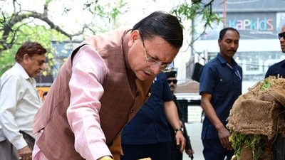 Uttarakhand CM Pushkar Singh Dhami inspects a complaint site in Dehradun following a CM Helpline 1905 grievance. Uttarakhand CM Pushkar Singh Dhami inspects a complaint site in Dehradun following a CM Helpline 1905 grievance.