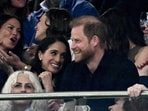 Prince Harry and Meghan Markle's recent trip to Bondi Beach garnered attention, especially a beachgoer who remained unfazed by their presence. AAP Image/Dan Himbrechts/ via REUTERS  