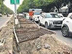 Mounds of debris, toppled grilles and open pits make these stretches perilous for commuters, especially after dark. (Sanjeev Sharma/HT)