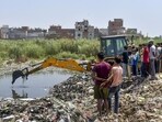 The ACP said the cremation ground gate has been unsecured for the past 10 years and was open, allowing the boys to enter. “The boy’s body was fished out around 4pm. His family refused his autopsy,” he said. (Saki Ali/HT Photo)