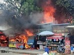 The market fire was full extinguished at about in one-and-a-half hours, and the fire at the flat in around 30 minutes, said officials. (Sakib Ali/HT Photo)