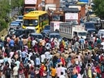 Thousands of workers employed at the hosiery complex in Noida Phase 2 staged a massive proteston April 10. (HT Photo/Sunil Ghosh)