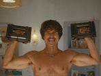 Charles Melton plays Austin, a freelance personal trainer, in Beef Season 2.