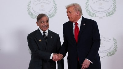 File: US President Donald Trump and Pakistani Prime Minister Shehbaz Sharif shake hands as they pose for a photo (REUTERS)