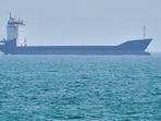 A tanker sits anchored in the Strait of Hormuz off the coast of Qeshm Island, Iran. A tanker sits anchored in the Strait of Hormuz off the coast of Qeshm Island, Iran.