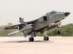 An IAF aircraft lands on Purvanchal Expressway as the Indian Air Force (IAF) conducts takeoff and landing practice, in Sultanpur on Wednesday. (ANI Video Grab)