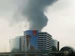 Smoke rising from an area near the Dubai International Airport after a drone attack hit a fuel tank, according to Dubai authorities, amid the US.-Israel conflict with Iran in March