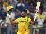 Chennai Super Kings' Sanju Samson celebrates after scoring a hundred against Mumbai Indians at the Wankhede Stadium. (Raju Shinde/HT)