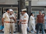 Delhi Police officials and forensic team members are seen at a residence in Kailash Hills, Amar Colony area, in New Delhi, India, on Wednesday, April 22, 2026, after the daughter of a senior Indian Revenue Service (IRS) official was found dead.