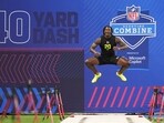 Ohio State linebacker Arvell Reese (20) gets ready to run the 40-yard dash at the NFL football scouting combine in Indianapolis.