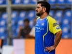 MS Dhoni with a robotic camera dog during a practice session ahead of the IPL 2026 match between Mumbai Indians and Chennai Super Kings