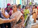 Chennai: Police personnel check credentials of voters before casting votes during the Tamil Nadu Assembly elections, in Chennai, Thursday, April 23, 2026.