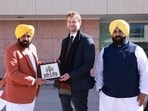 Punjab chief minister Bhagwant Mann with an official of University of Turku in Finland. (HT)