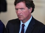 Roberta Hunt challenges Tucker Carlson's denial of their familial connection, citing mistreatment and a lawsuit over inheritance rights to the Swanson fortune. (AP Photo/Alex Brandon)