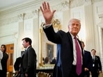 US President Donald Trump departs after speaking in the State Dining Room of the White House in Washington, DC, US, on Tuesday. (Bloomberg)