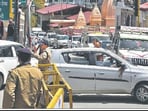 Heavy traffic from Dehradun chokes Library Chowk; and a multi-storey under construction structure blocks a part of Mall Road in Mussoorie.
