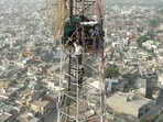Activist Gurjeet Singh Khalsa, who had climbed a 400-foot BSNLtower on October 12, 2024, being brought down safely in Samana town of Patiala district on Friday morning. (HT Photo) Activist Gurjeet Singh Khalsa, who had climbed a 400-foot BSNLtower on October 12, 2024, being brought down safely in Samana town of Patiala district on Friday morning. (HT Photo)