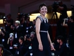 Maggie Gyllenhaal on the red carpet of the 80th Venice Film Festival on September 8, 2023 at Venice Lido. (Photo by GABRIEL BOUYS / AFP)(AFP)