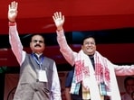 Nalbari: Union Ports, Shipping and Waterways Minister Sarbananda Sonowal, right, waves to the gathering during a public rally in support of BJP candidate for Tihu constituency Chandra Mohan Patowary, left, ahead of Assam Assembly Election, in Nalbari district, Sunday, April 5, 2026. Nalbari: Union Ports, Shipping and Waterways Minister Sarbananda Sonowal, right, waves to the gathering during a public rally in support of BJP candidate for Tihu constituency Chandra Mohan Patowary, left, ahead of Assam Assembly Election, in Nalbari district, Sunday, April 5, 2026.