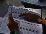Thane, India - December -02, 2025: KulgaonÐBadlapur Municipal Council (nager Parishad)General Election 2025: In Badlapur, Thane district, voting for the KulgaonÐBadlapur Municipal Council (nager Parishad) has begun on Tuesday Voters searching name in Voter list at the polling stations at badalapur East ,in Thane ,in Mumbai, India, on, Tuesday, December -02, 2025. ( Praful Gangurde / HT Photo) (Praful Gangurde) Thane, India - December -02, 2025: KulgaonÐBadlapur Municipal Council (nager Parishad)General Election 2025: In Badlapur, Thane district, voting for the KulgaonÐBadlapur Municipal Council (nager Parishad) has begun on Tuesday Voters searching name in Voter list at the polling stations at badalapur East ,in Thane ,in Mumbai, India, on, Tuesday, December -02, 2025. ( Praful Gangurde / HT Photo) (Praful Gangurde)