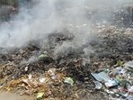 The fire seen on Friday at the Sec 12 bus stand in Gurugram. (HT)