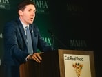 Calley Means, senior advisor at Health and Human Services (HHS) and co-founder of TrueMed, speaks during an "Eat Real Food" rally at Brazos Hall in Austin, Texas.