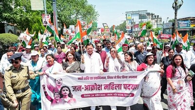 Uttarakhand Chief Minister Pushkar Singh Dhami participates in the Mahila Jan Akrosh Rally against the opposition after the Nari Shakti Vandan Act fails to pass in Lok Sabha. (@pushkardhami X) Uttarakhand Chief Minister Pushkar Singh Dhami participates in the Mahila Jan Akrosh Rally against the opposition after the Nari Shakti Vandan Act fails to pass in Lok Sabha. (@pushkardhami X)