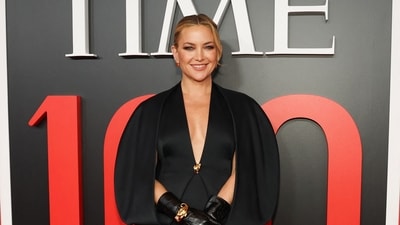 Kate Hudson looked gorgeous in black on the red carpet as she wore an ensemble from Khaite's Fall 2026 collection. It comprises a deep V-neck midi dress paired with a matching structured cape, sheer black tights, and pointed-toe heels. The actor accessorised with a pair of black leather gloves and minimalist gold jewellery. (AFP) Kate Hudson looked gorgeous in black on the red carpet as she wore an ensemble from Khaite's Fall 2026 collection. It comprises a deep V-neck midi dress paired with a matching structured cape, sheer black tights, and pointed-toe heels. The actor accessorised with a pair of black leather gloves and minimalist gold jewellery. (AFP)