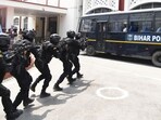 Anti-Terrorism Squad (ATS) personnel perform a mock drill at the Patna High Court premises on Saturday. (Santosh Kumar /HT)