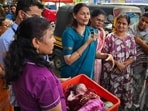 Dr Sunita Pote (centre), a gynaecologist, who helped deliver the baby along with other locals. (HT PHOTO)