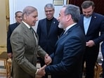 Pakistan Prime Minister Shehbaz Sharif, left, greets Iran's Foreign Minister Abbas Araghchi before their meeting in Islamabad, Pakistan, Saturday, April 25, 2026. 