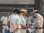 Police at the scene of the crime. (Sanjeev Verma/HT Photo)