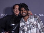 Rihanna poses with paparazzi at an event in India.