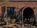 The front entryway at the home of Nancy Guthrie, the missing mother of "Today" show host Savannah Guthrie, is seen on Friday, March 6, 2026, in Tucson, Ariz. (AP Photo/Rebecca Noble)