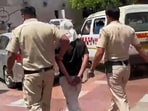 The primary suspect in the Kailash Hills murder case at Saket Court on Thursday.
