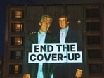 Photos of President Trump along with late sexual offender Jeffrey Epstein were projected onto the hotel.
