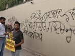 Aam Aadmi Party workers staging a protest outside the residence of MP Rajinder Gupta, owner of Trident Group, following his political shift to the BJP. The AAP workers wrote ‘gaddar’ (traitor) on the main gate of the house, on Saturday, April 25, 2026. 