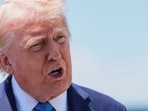 Trump speaks to the media before departing Palm Beach International Airport en route to Joint Base Andrews, in West Palm Beach, Florida on April 25.