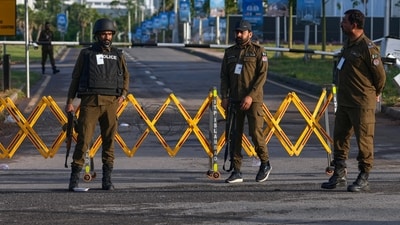 Police officers stand guard at a checkpoint in Islamabad, Pakistan. (Photo for representation) (AP)