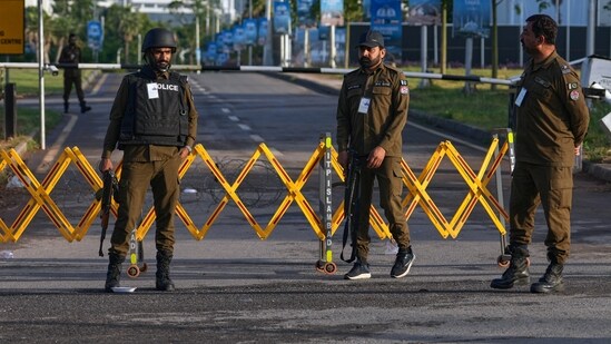 Police officers stand guard at a checkpoint in Islamabad, Pakistan. (Photo for representation) (AP)